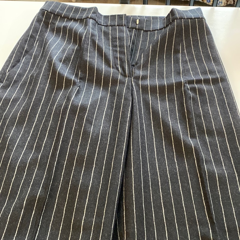 Gunex Woman’s pinstripe pants.